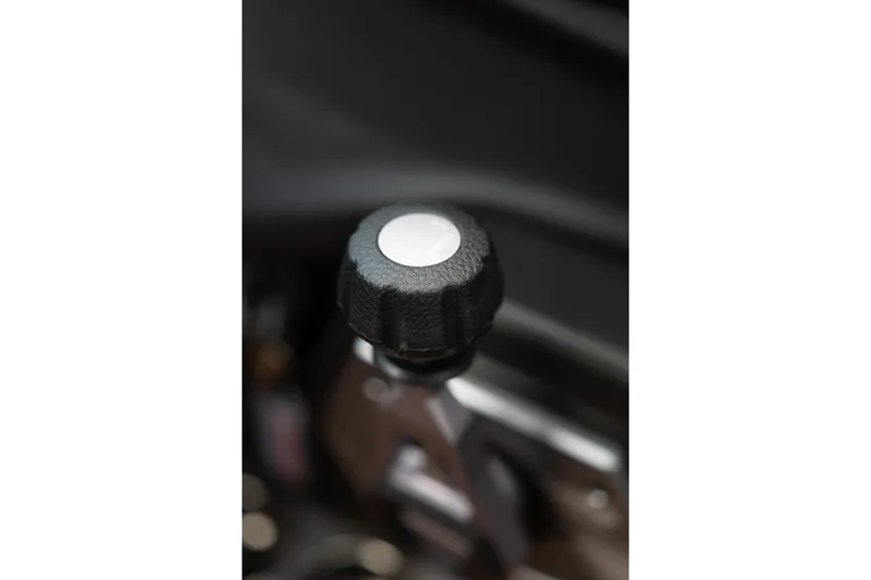 Slide: The Image of Close-up of 2025 Supra SE 550 control knob in a vehicle interior. - 36