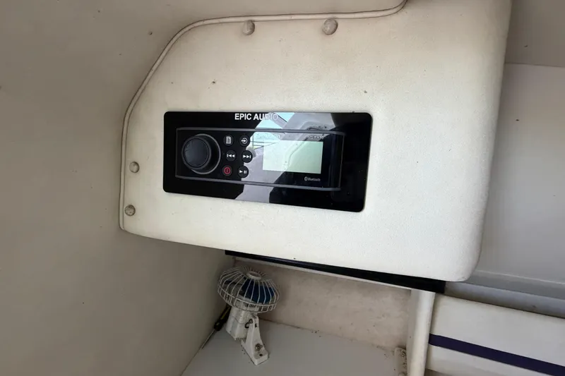 Slide: The Image of Audio system with Bluetooth in 2004 Envision 3200 Intruder boat interior. - 20