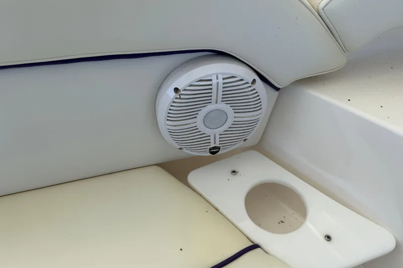 Slide: The Image of Boat interior with speaker and cup holder, Envision 3200 Intruder, 2004 model. - 25