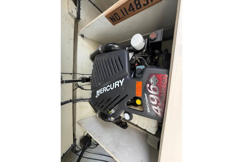 Slide: The Image of Engine compartment of a 2004 Envision 3200 Intruder with Mercury MerCruiser 496 MAG HO engine. - 28