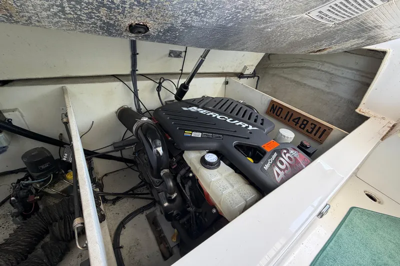 Slide: The Image of Engine compartment of 2004 Envision 3200 Intruder with Mercury 496 engine. - 29