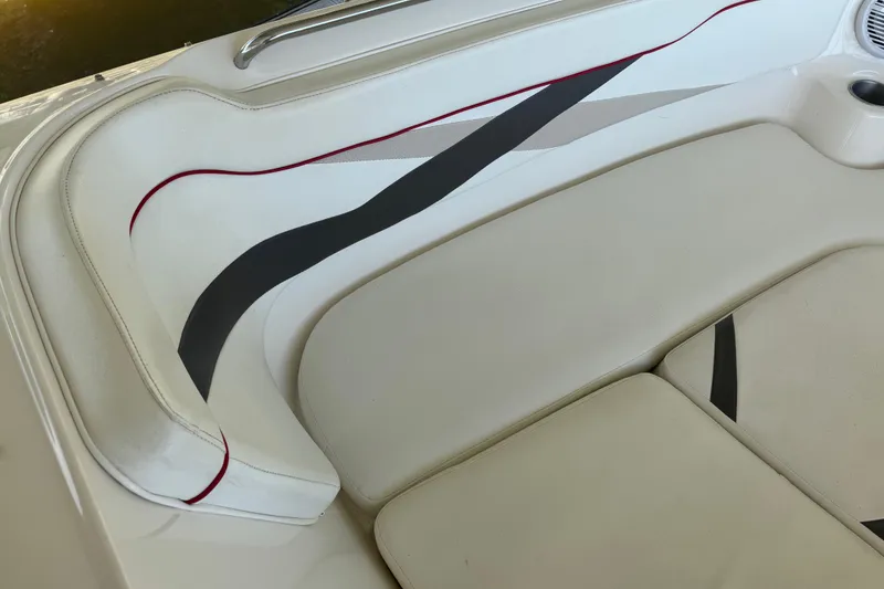 Slide: The Image of 2006 Rinker 282 Captiva Bowrider interior seating with stylish design and comfortable upholstery. - 16