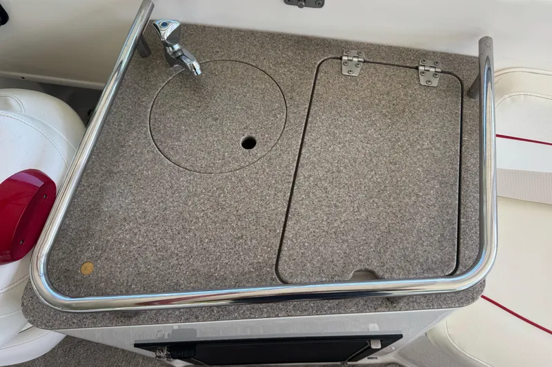 Slide: The Image of 2006 Rinker 282 Captiva Bowrider sink and countertop with faucet detail. - 20