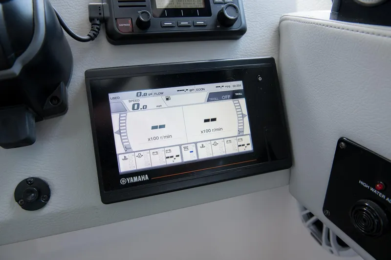 Slide: The Image of Yamaha display on 2026 Regal 36 XO boat dashboard, showing speed and RPM metrics. - 15