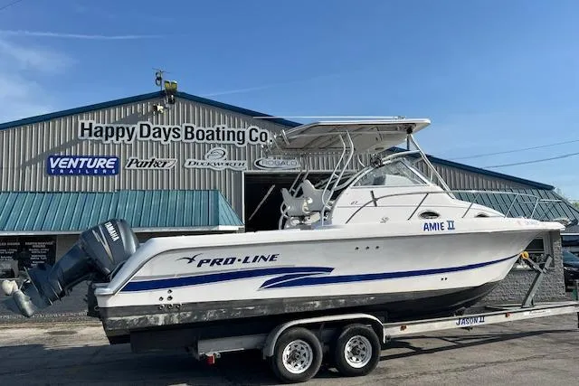 The Image of 2003 Pro-Line 27 Walk boat on trailer at Happy Days Boating Co. - 0
