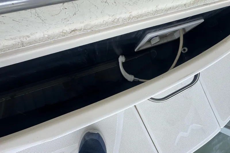Slide: The Image of Storage compartment on a 2002 Maxum 2300 Premiere Edition boat. - 16