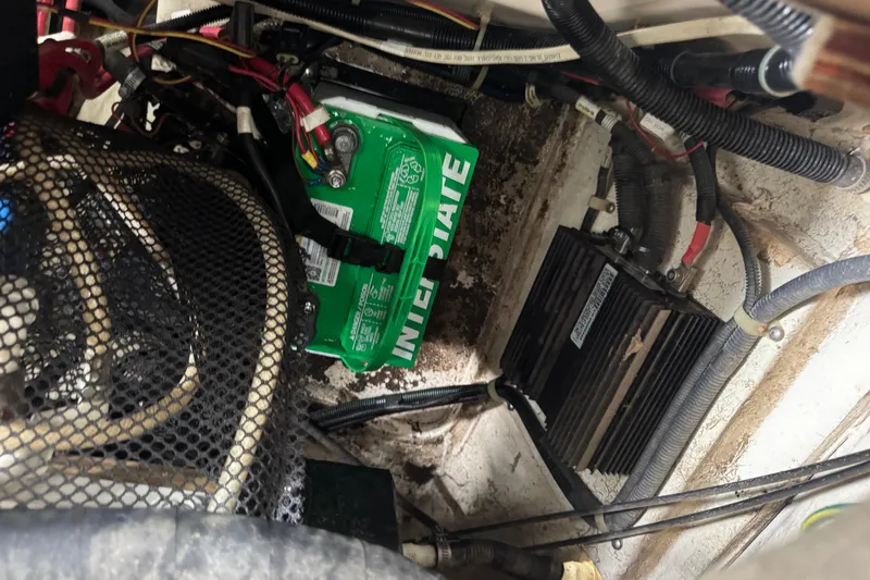 Slide: The Image of Engine compartment of 2002 Maxum 2300 Premiere Edition with Interstate battery and wiring. - 17