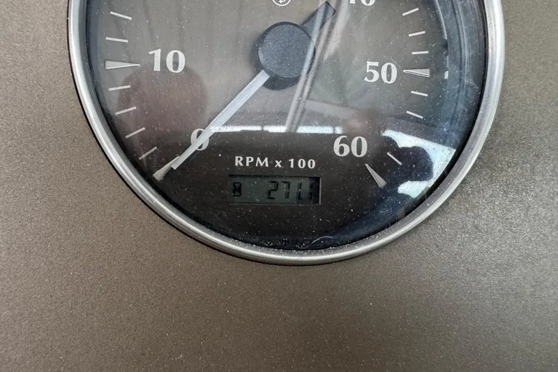 Slide: The Image of Close-up of a 2002 Maxum 2300 Premiere Edition RPM gauge showing 2711 RPM. - 18