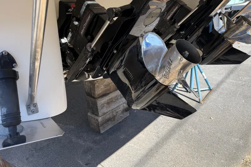 Slide: The Image of Rear view of a 2000 Regal Commodore 2960 boat with MerCruiser outdrive. - 3