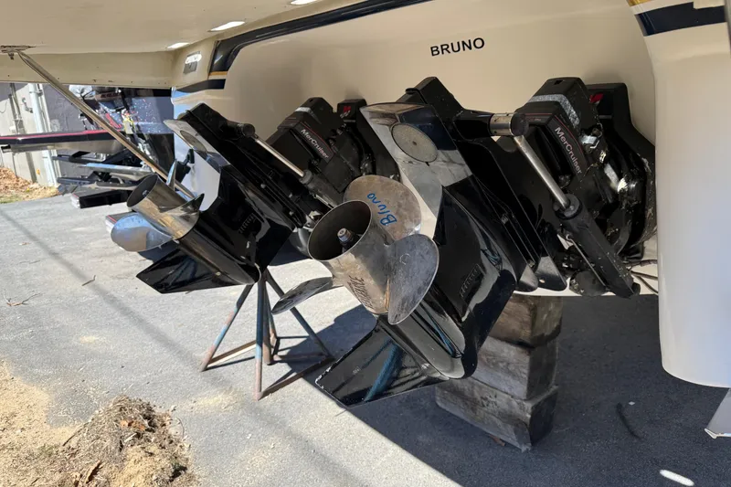 Slide: The Image of Rear view of 2000 Regal Commodore 2960 boat with dual MerCruiser outdrives. - 5