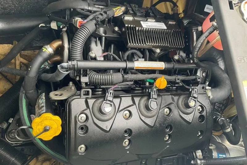 Slide: The Image of 2014 Sea-Doo Wake Pro 215 engine, detailed view of components and wiring. - 3