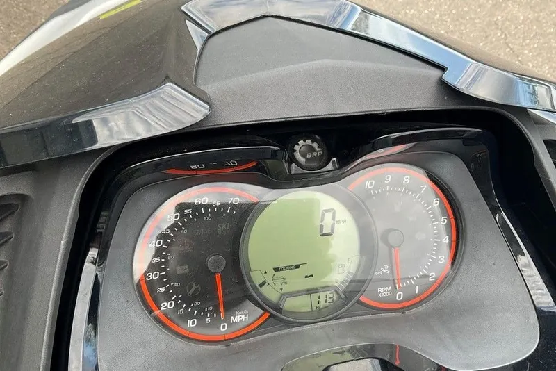 Slide: The Image of Dashboard of a 2014 Sea-Doo Wake Pro 215, showing speedometer and tachometer. - 4