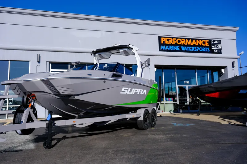 The Image of 2024 Supra SA 450 boat displayed at Performance Marine Watersports dealership. - 1