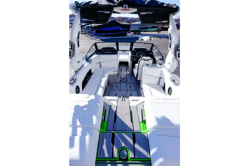 Slide: The Image of 2024 Supra SA 450 boat interior with sleek seating and modern design features. - 13