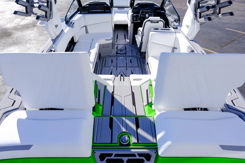 Slide: The Image of 2024 Supra SA 450 boat interior with white seating and modern design. - 14