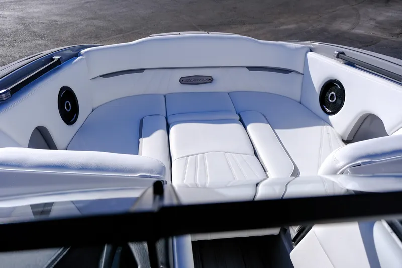 Slide: The Image of Luxurious interior of 2024 Supra SA 450 boat with white seating and speakers. - 16