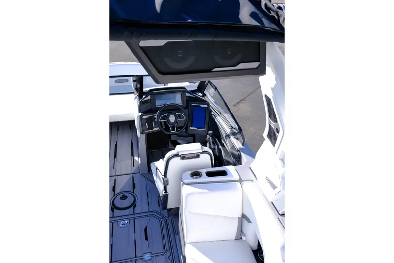 Slide: The Image of 2024 Supra SA 450 boat interior with modern dashboard and sleek seating design. - 20