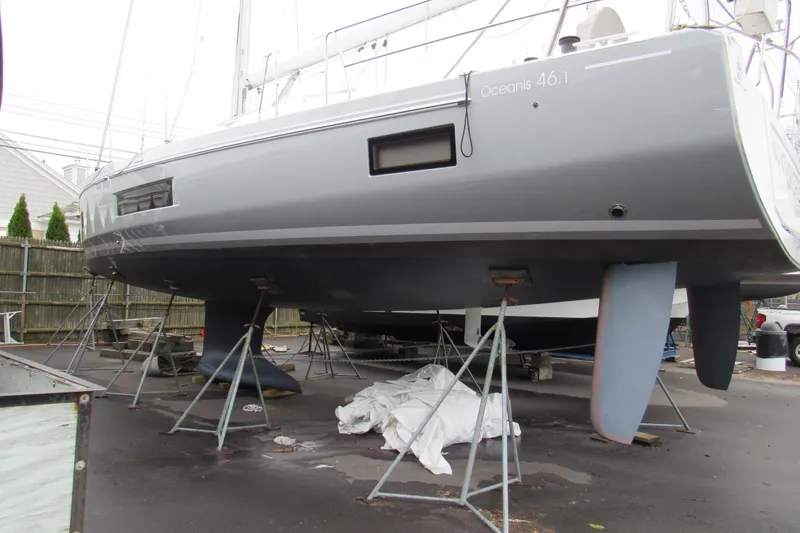 Slide: The Image of 2020 Beneteau Oceanis 46.1 sailboat on stands, showcasing sleek hull design. - 11