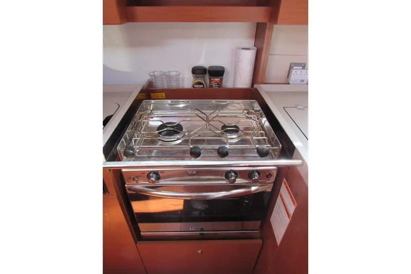 Slide: The Image of Modern kitchen stove in a 2020 Beneteau Oceanis 46.1 yacht galley. - 36