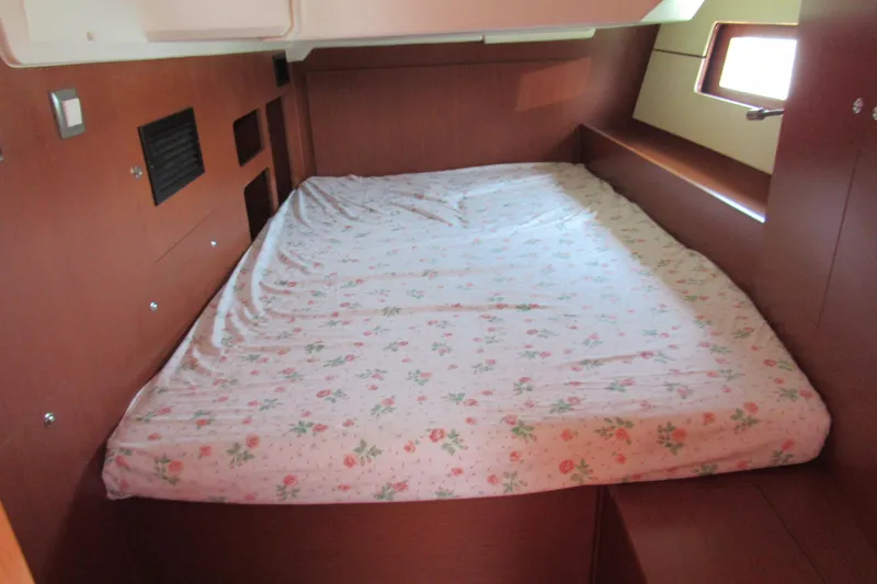 Slide: The Image of Cozy cabin interior of 2020 Beneteau Oceanis 46.1 with floral bedding. - 39