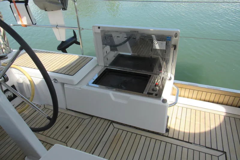 Slide: The Image of Outdoor grill on 2020 Beneteau Oceanis 46.1 yacht deck, overlooking water. - 43