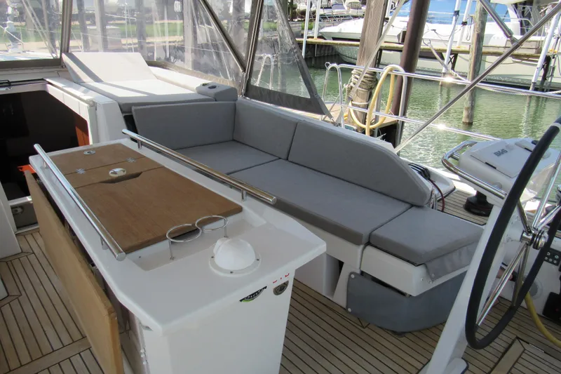 Slide: The Image of 2020 Beneteau Oceanis 46.1 yacht cockpit with seating and steering wheel. - 48