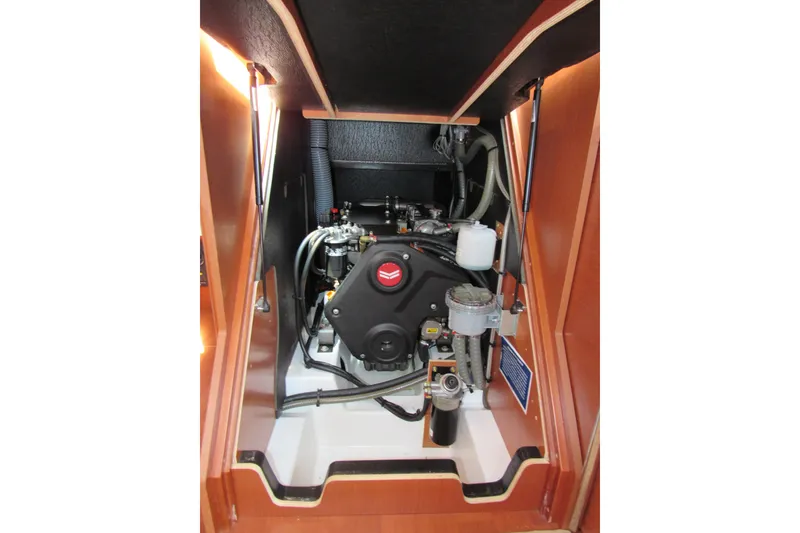 Slide: The Image of Engine compartment of 2020 Beneteau Oceanis 46.1 sailboat, showcasing mechanical components. - 53