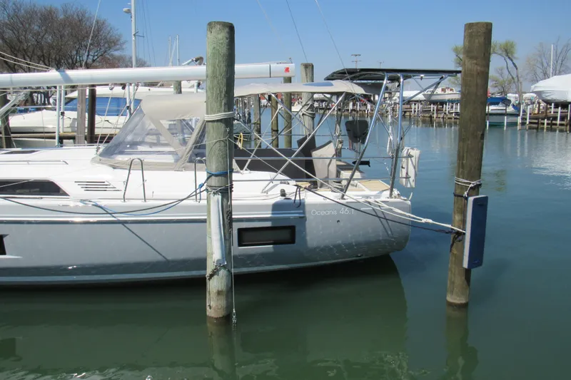 Slide: The Image of 2020 Beneteau Oceanis 46.1 yacht docked at marina, side view. - 7