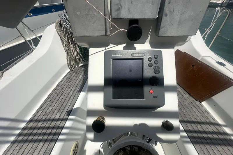 Slide: The Image of Cockpit of 2006 Beneteau Oceanis Clipper 323 with Raymarine navigation system. - 41