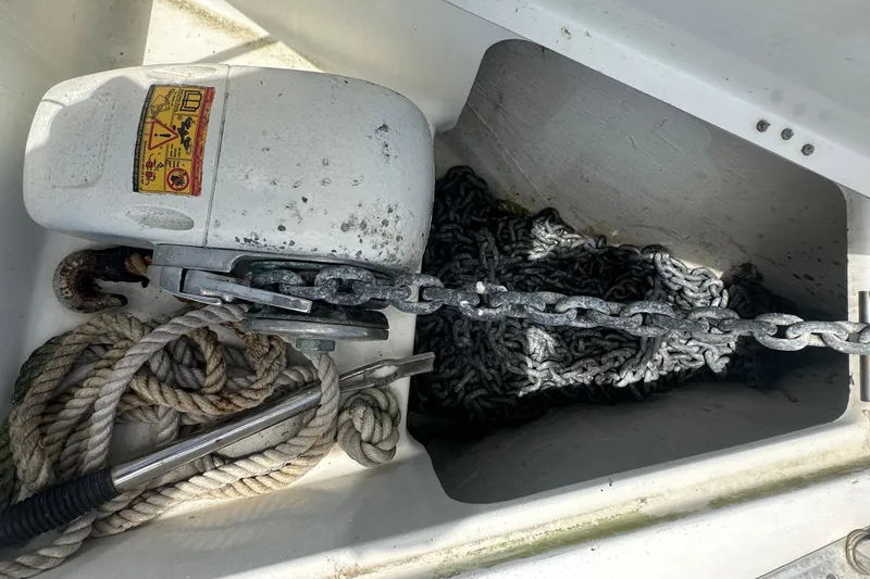 Slide: The Image of Anchor chain and rope in a 2006 Beneteau Oceanis Clipper 323 sailboat's anchor locker. - 43