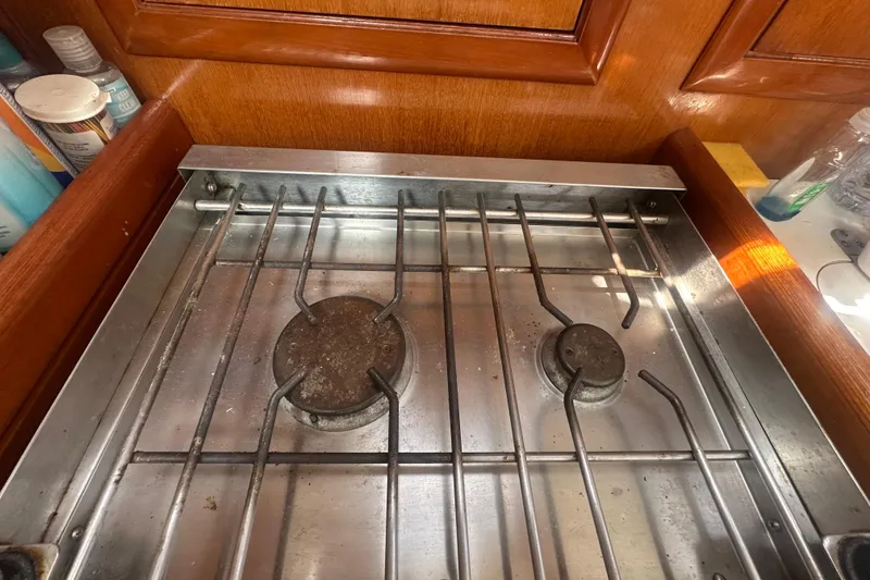 Slide: The Image of Stainless steel stove in 2006 Beneteau Oceanis Clipper 323 yacht kitchen. - 66