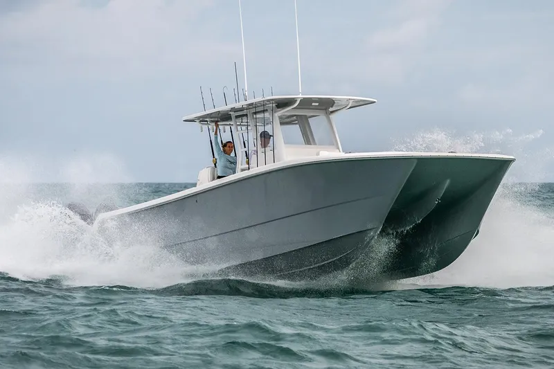 Slide: The Image of Manufacturer Provided Image: 2021 Invincible 35 Catamaran cruising on the ocean. - 4
