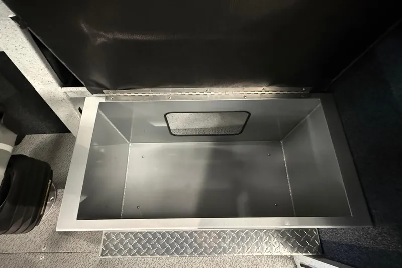 Slide: The Image of Storage compartment in 2025 KingFisher Escape HT boat, featuring durable metal construction. - 16