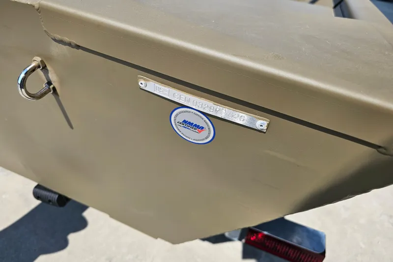 Slide: The Image of 2026 G3 Gator Tough 1652 VBW boat with identification plate and certification sticker. - 4