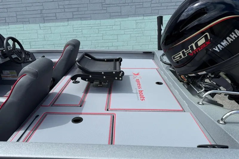Slide: The Image of 2026 Xpress H18C Crappie boat interior with Yamaha SHO VMAX engine. - 6