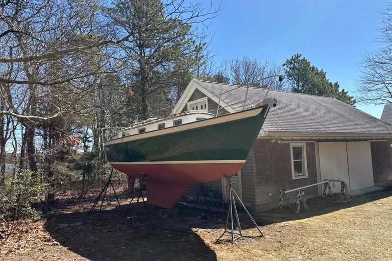Slide: The Image of Sailboat "Shimmer" on stands, Peter Scott Chuck Paine 30, 1998, Pocasset, MA. - 2