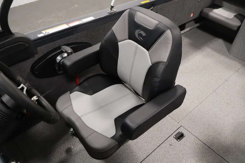 Slide: The Image of 2026 Crestliner 2050 Authority boat interior with black and gray captain's chair. - 37