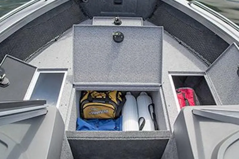 Slide: The Image of Storage compartments in 2026 Crestliner 2050 Authority boat, featuring organized gear and equipment. - 6