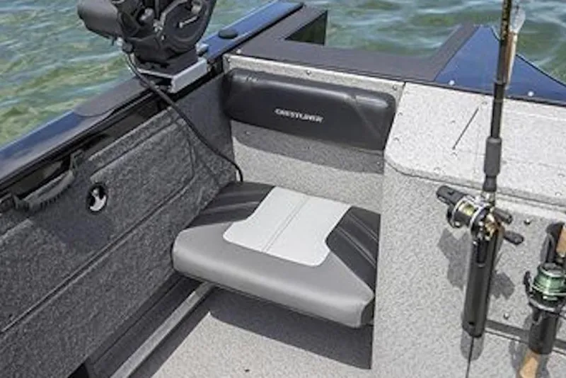 Slide: The Image of 2026 Crestliner 2050 Authority boat interior with fishing rod holder and cushioned seating. - 8