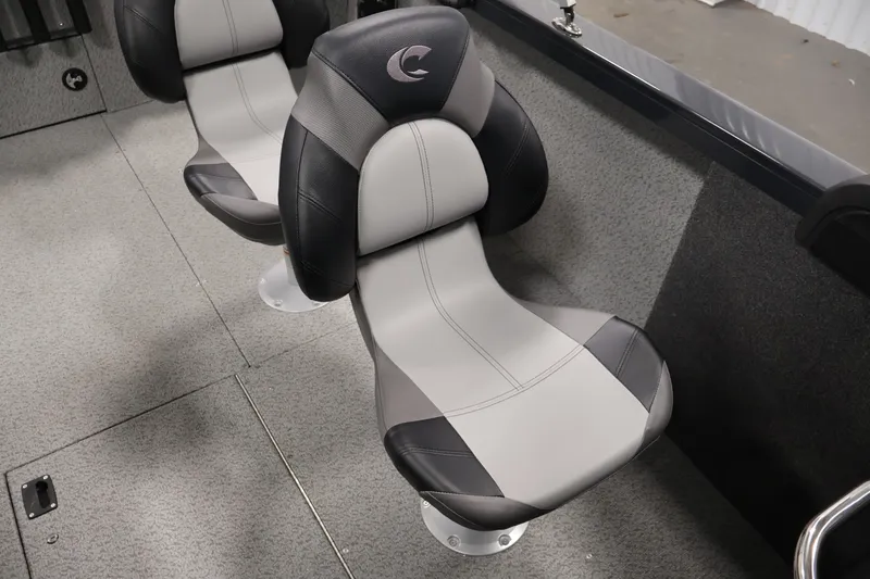 Slide: The Image of 2026 Crestliner 2050 Authority boat seats, featuring sleek black and gray design. - 39