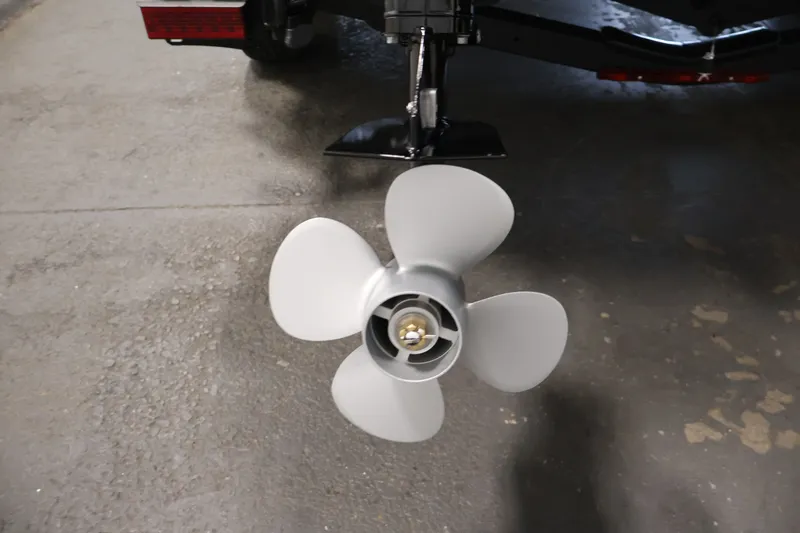 Slide: The Image of Propeller of 2026 Crestliner 2050 Authority boat, displayed in a garage setting. - 52