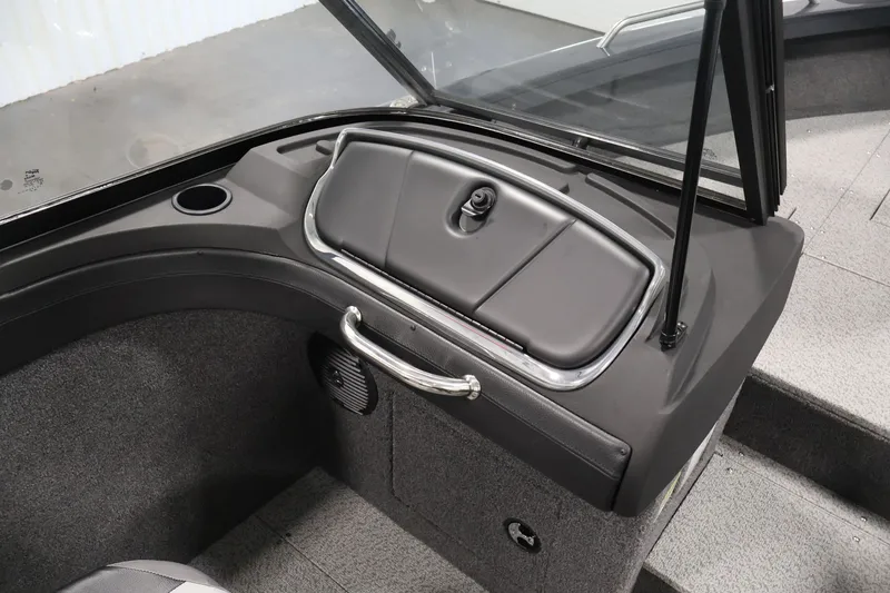 Slide: The Image of Interior of 2026 Crestliner 2050 Authority boat with storage compartment and cup holder. - 38