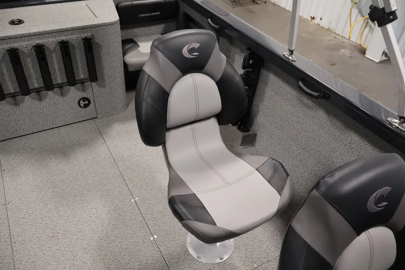 Slide: The Image of 2026 Crestliner 2050 Authority boat interior with gray and black seating. - 40