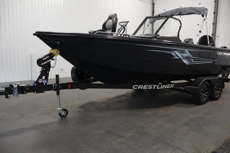 Slide: The Image of 2026 Crestliner 2050 Authority boat on trailer in indoor setting. - 55