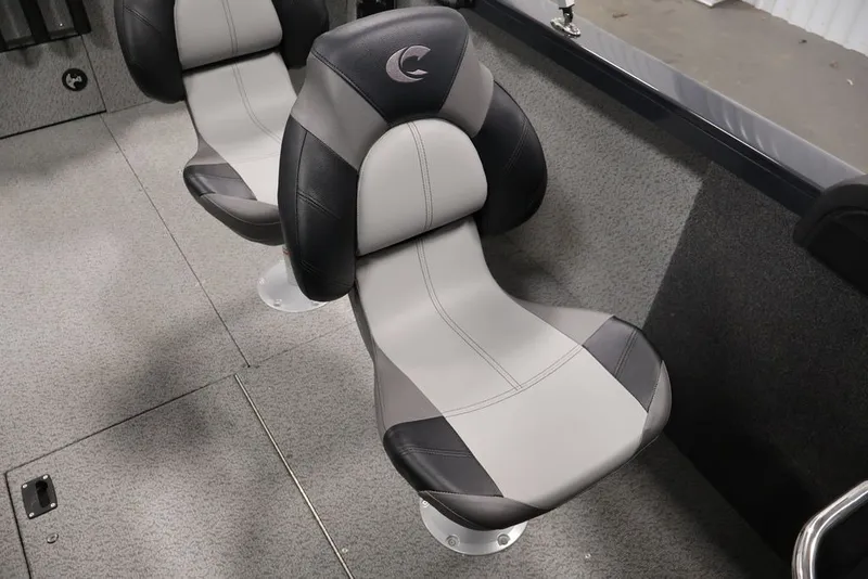 Slide: The Image of Crestliner 2050 Authority 2027 boat seats, featuring sleek black and gray design. - 43