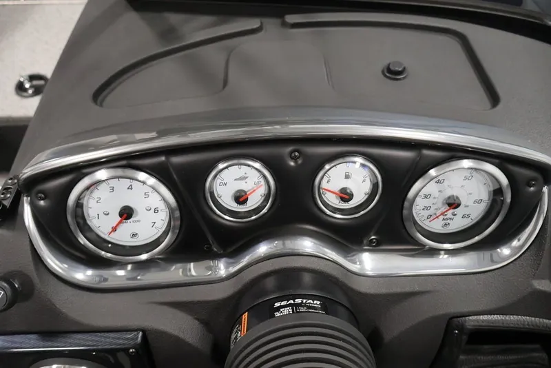 Slide: The Image of Dashboard of 2027 Crestliner 2050 Authority boat with gauges and controls. - 30