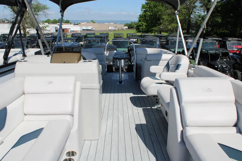 Slide: The Image of 2024 SunCatcher Select 22RC pontoon boat with spacious seating and modern design. - 7