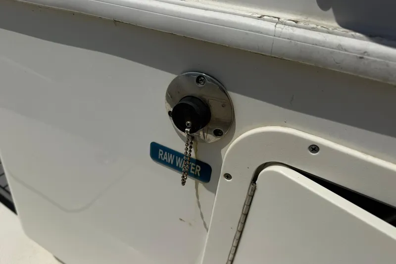 Slide: The Image of Raw water outlet on 2020 World Cat 325 CC boat. - 21