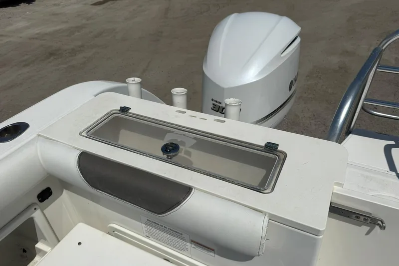 Slide: The Image of 2020 World Cat 325 CC boat with Yamaha engine and livewell. - 26