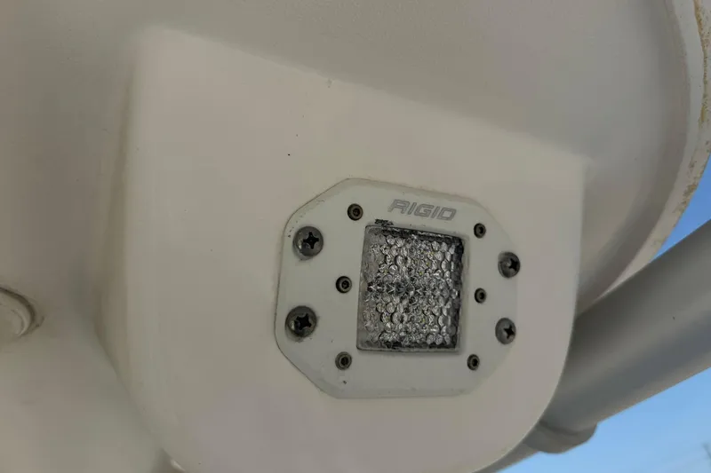 Slide: The Image of Close-up of a Rigid light fixture on a 2020 World Cat 325 CC boat. - 31